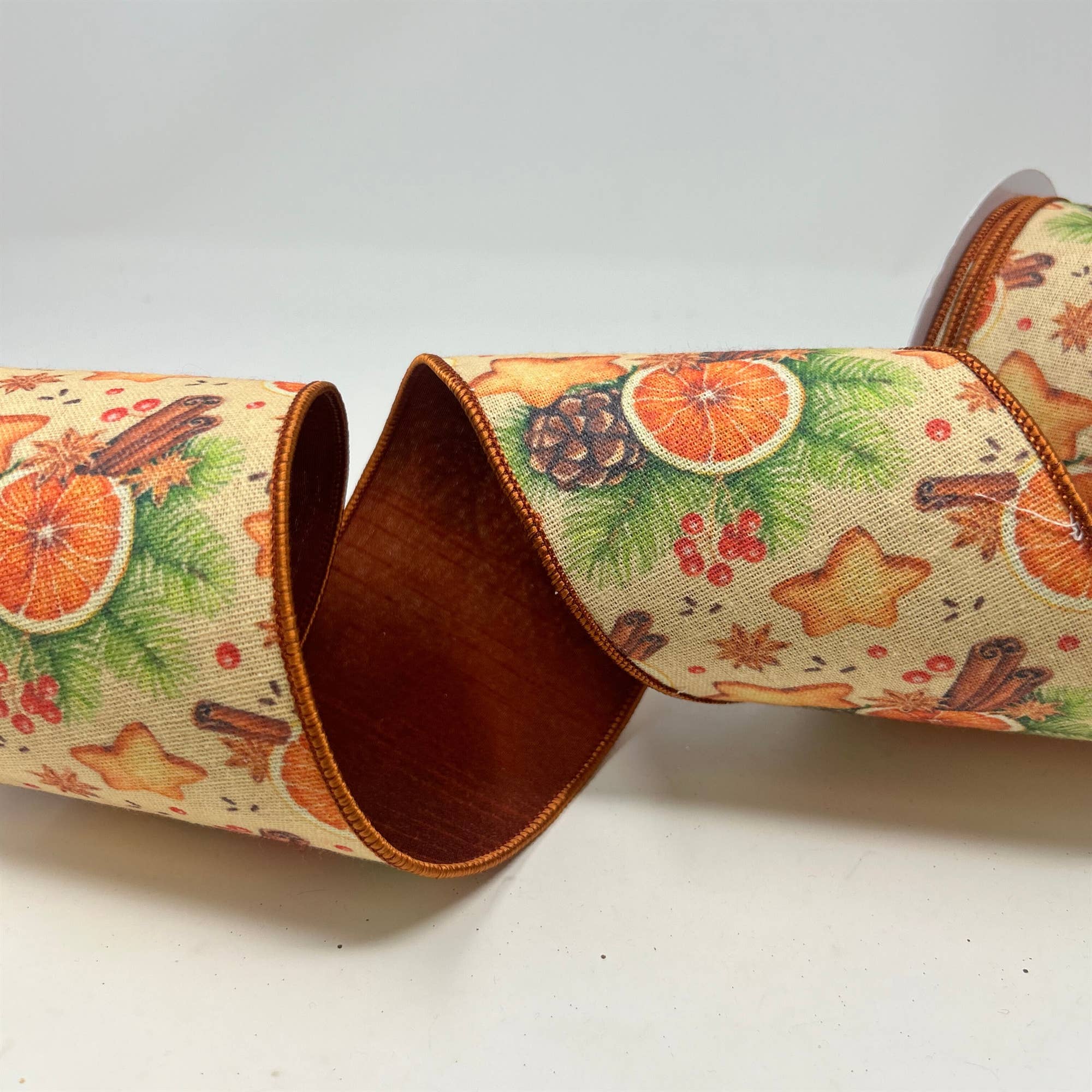 Orange and Cinnamon Print on Brown Ribbon Base 4" x 10yd